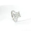 Solitaire in white gold with cushion-cut lab-grown diamond, 5.11 carats.