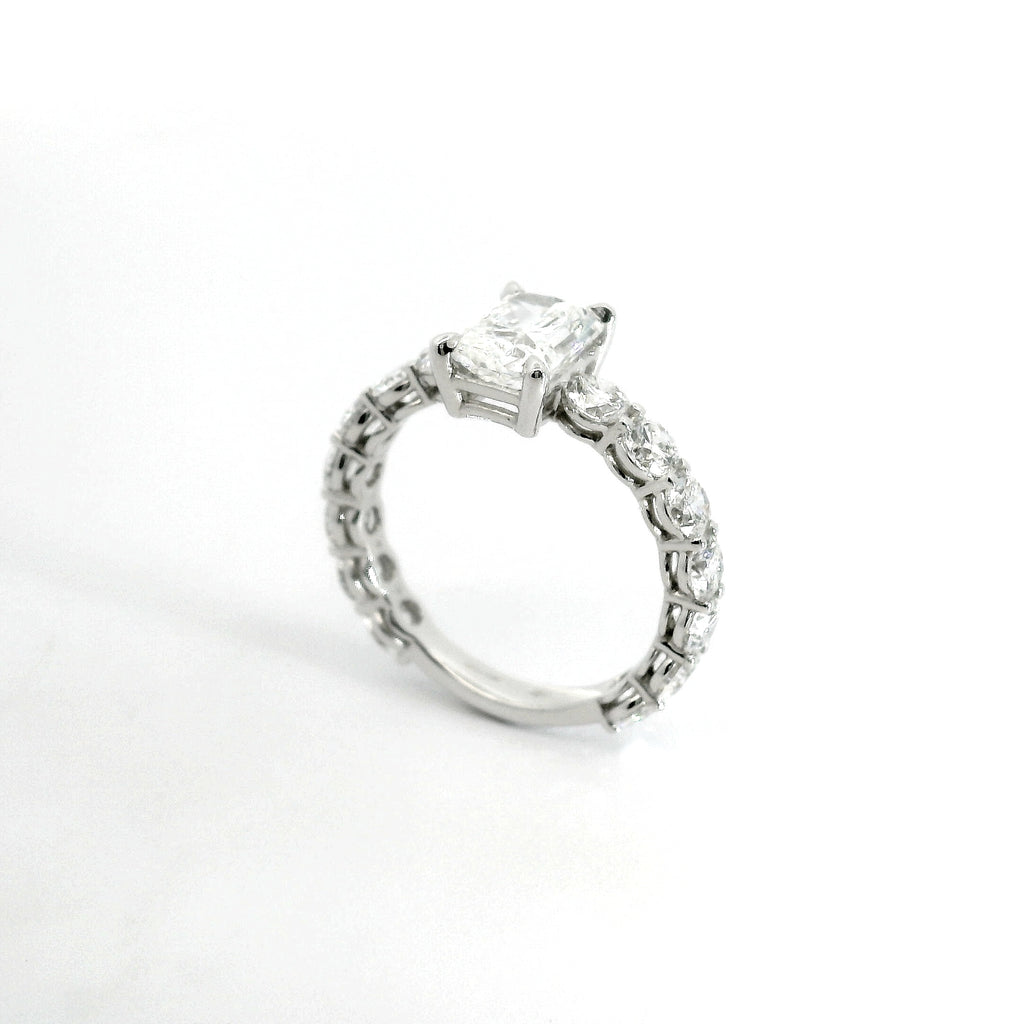 Solitaire with radiant cut lab-grown diamond and brilliant cut lab-grown diamonds on the shank, 3.81 carats.