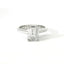 Solitaire in white gold with emerald-cut lab-grown diamond, 3.04 carats.