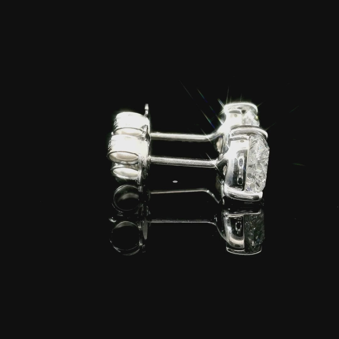 Point light earrings with heart-cut lab-grown diamonds, 1.68 carats.
