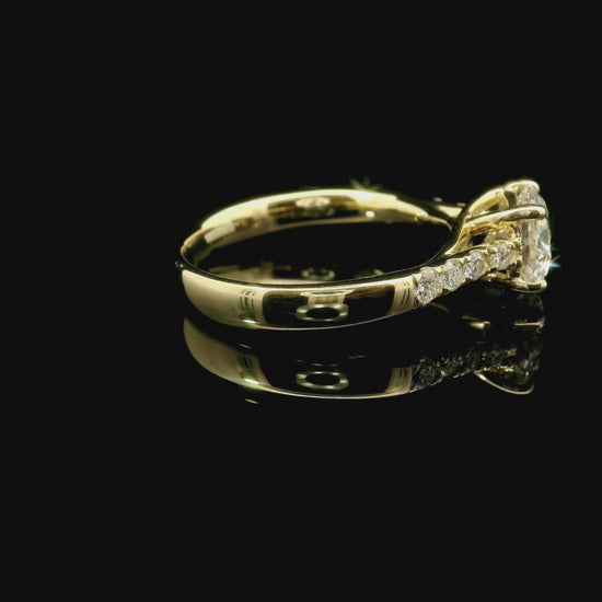 White gold solitaire with brilliant-cut diamonds on the shank, 1.08 carats.