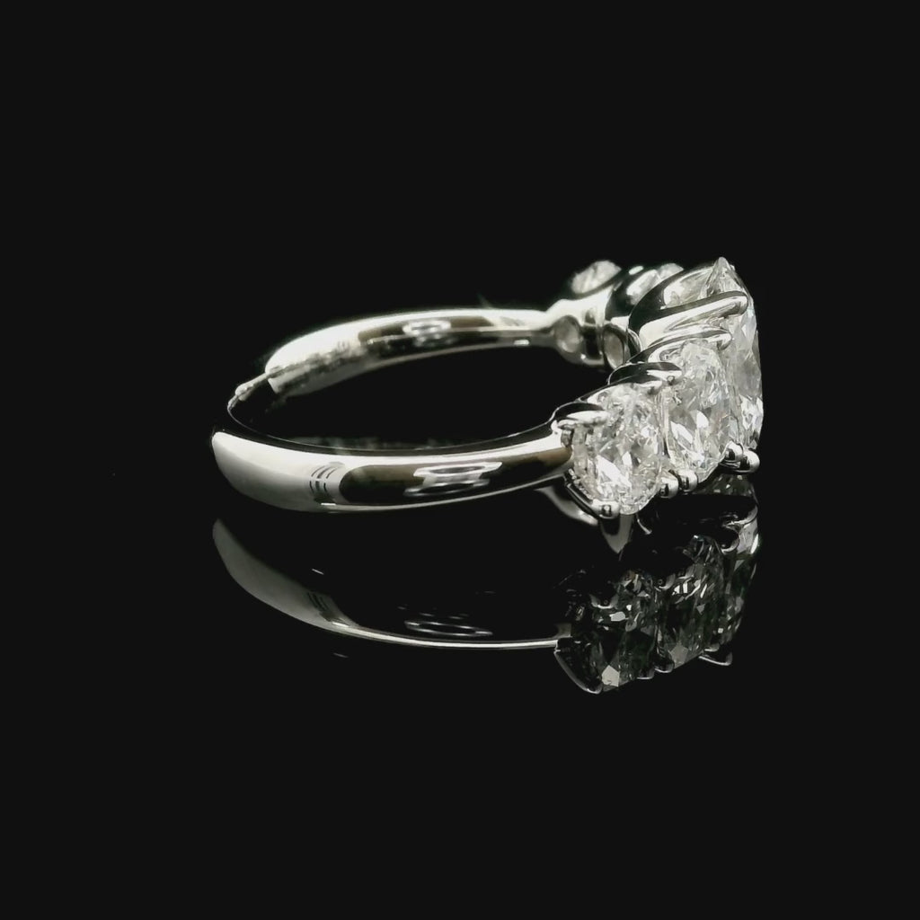 White gold gradation band ring with 5 oval-cut lab-grown diamonds, 3.20 carats.