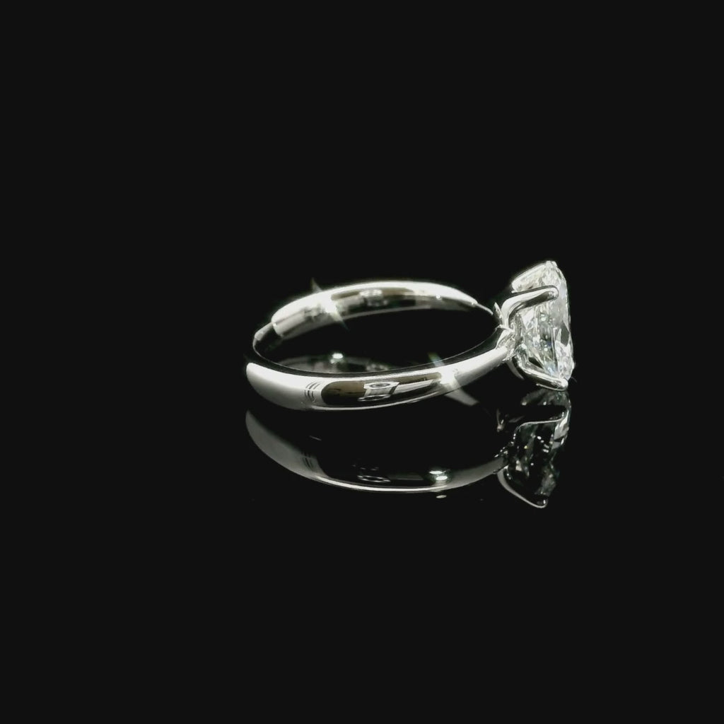 Solitaire in white gold with oval-cut lab-grown diamond, 1.54 carats.