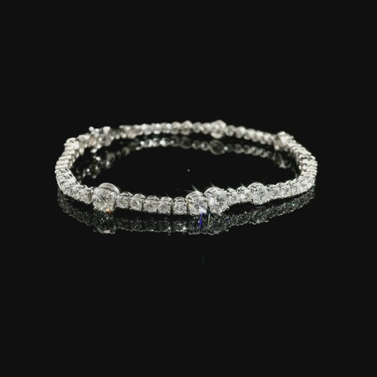 White gold wire spot tennis bracelet with brilliant-cut lab-grown diamonds, 6.06 carats.