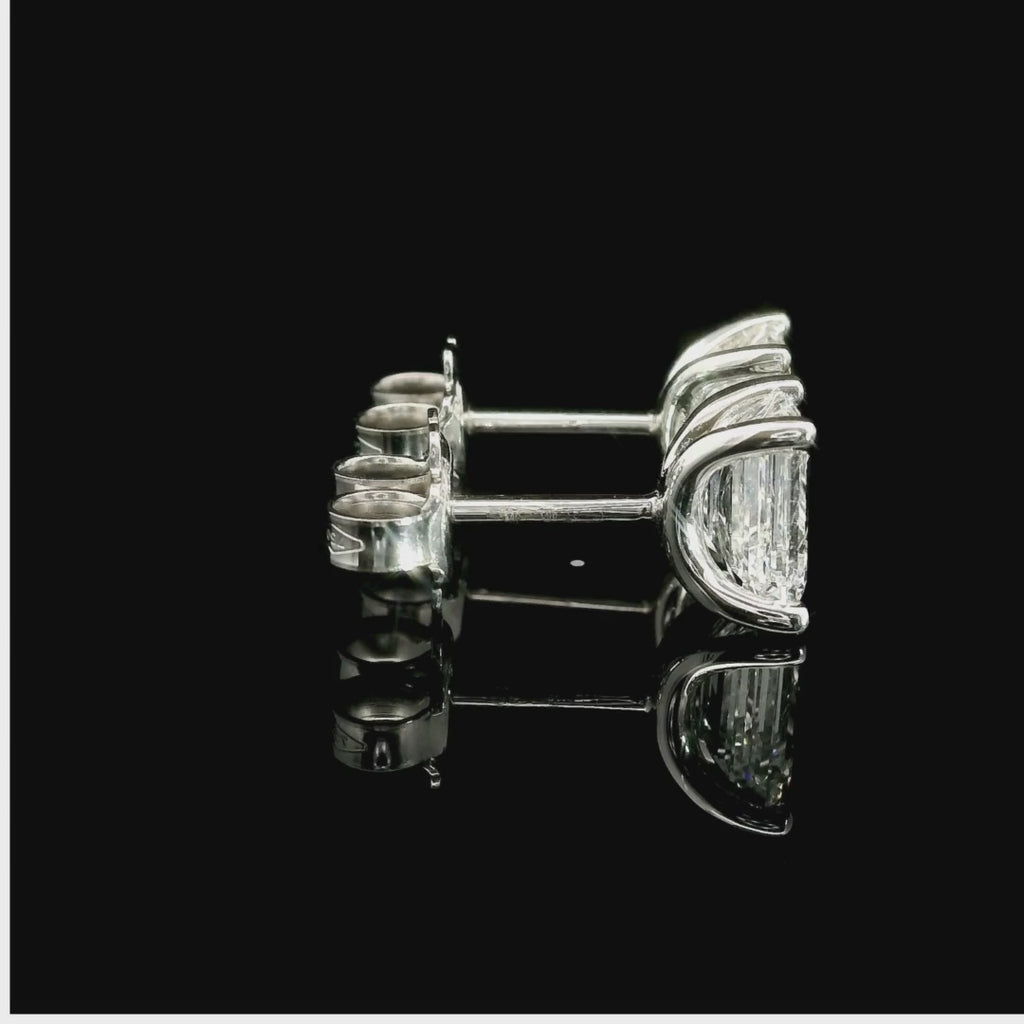White gold stud earrings with emerald-cut lab-grown diamond, 2.07 carats.