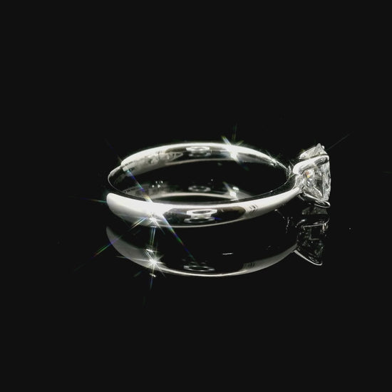 White gold solitaire with oval-cut lab-grown diamond, 0.50 carats.