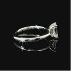 Solitaire in white gold with emerald-cut lab-grown diamond, 1.00 carats.