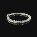 White gold wire tennis bracelet with brilliant-cut lab-grown diamonds, 5.54 carats.
