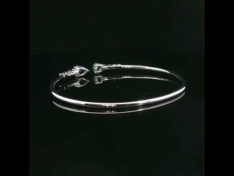 Bracciale Twin in oro bianco con zaffiro, smeraldo e diamanti Lab-Grown taglio brillante.