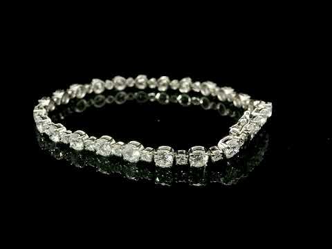 Bracciale tennis a filo in oro bianco con spot di diamanti lab-grown taglio brillante, 8,15 carati.