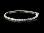 Bracciale tennis a filo in oro bianco e diamanti lab-grown taglio brillante, 2,58 carati.