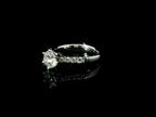 White gold solitaire with brilliant-cut lab-grown diamonds on the shank, 1.08 carats.