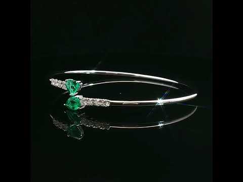 Bracciale Twin in oro bianco con smeraldi Lab-Grown e diamanti Lab-Grown taglio brillante.
